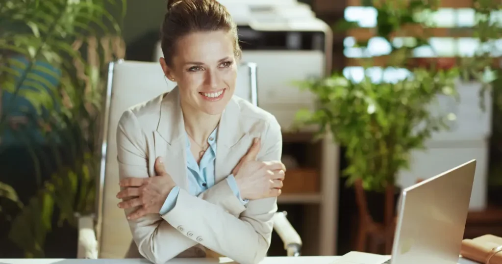 A woman using the Butterfly Hug technique for emotional regulation and stress relief.