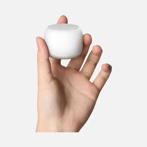 A compact mini white noise machine designed to promote better sleep and focus, ideal for travel and home use.